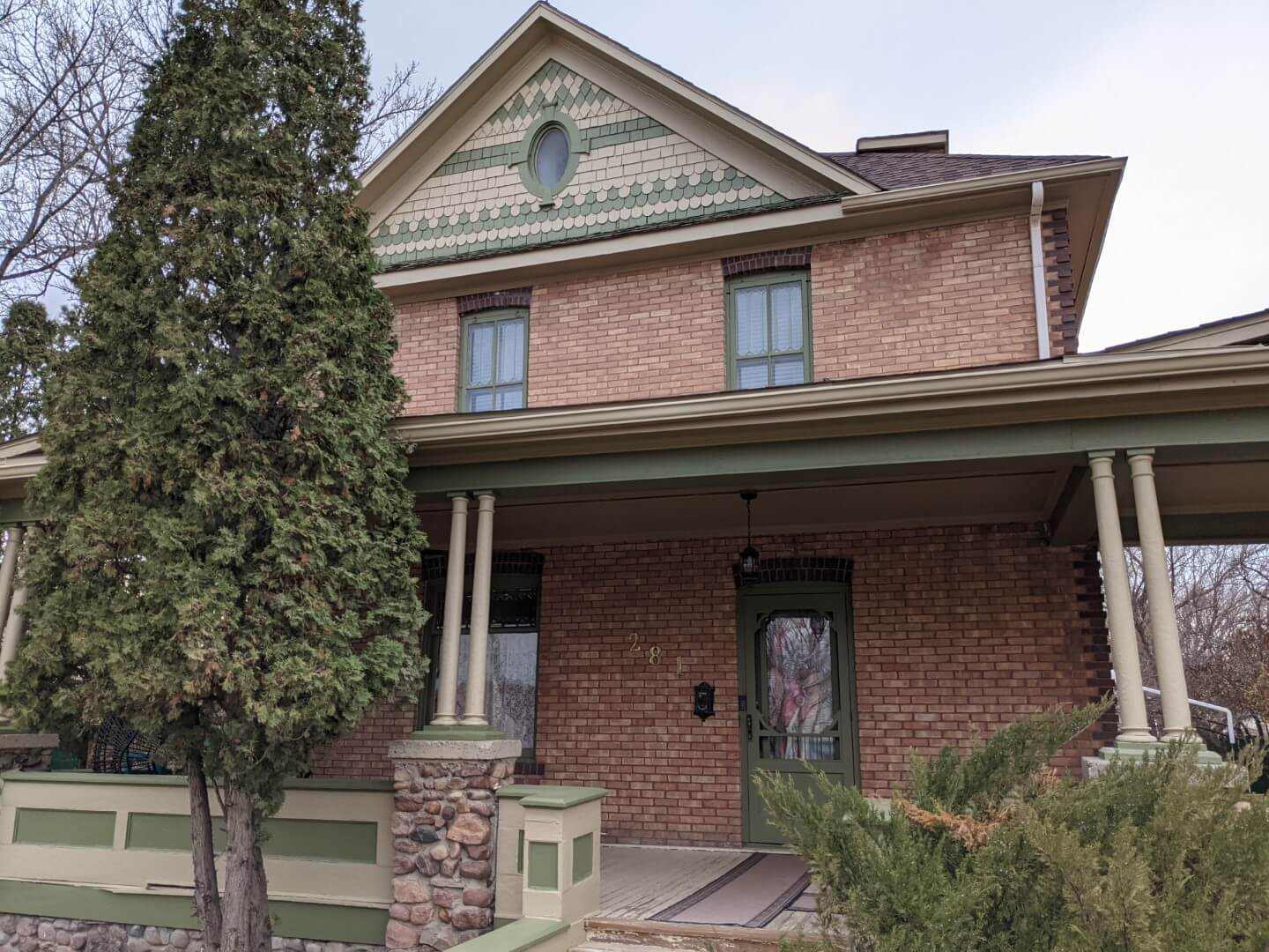 A house with a tree in front