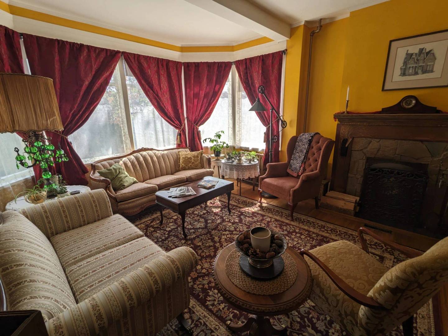 A cozy living room with couches and a fireplace